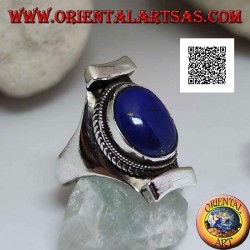 Silver ring with oval lapis lazuli surrounded by interlacing on Nepalese setting