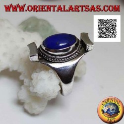 Silver ring with oval lapis lazuli surrounded by interlacing on Nepalese setting