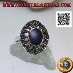 Silver ring with oval lapis lazuli on a rounded perforated oval studded with marcasite