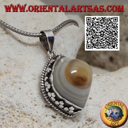 Silver pendant in yellow Shiva's eye with cabochon shuttle surrounded by interlacing and trio of discs