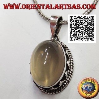 Silver pendant with cabochon oval moonstone surrounded by interlacing and trio of discs