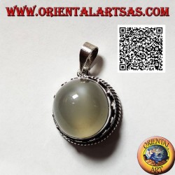 Silver pendant with round cabochon moonstone surrounded by interlacing and trio of discs