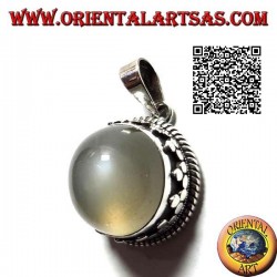 Silver pendant with round cabochon moonstone surrounded by interlacing and trio of discs
