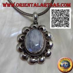 Silver pendant with an oval rainbow moonstone (adularia) surrounded by perforated discs