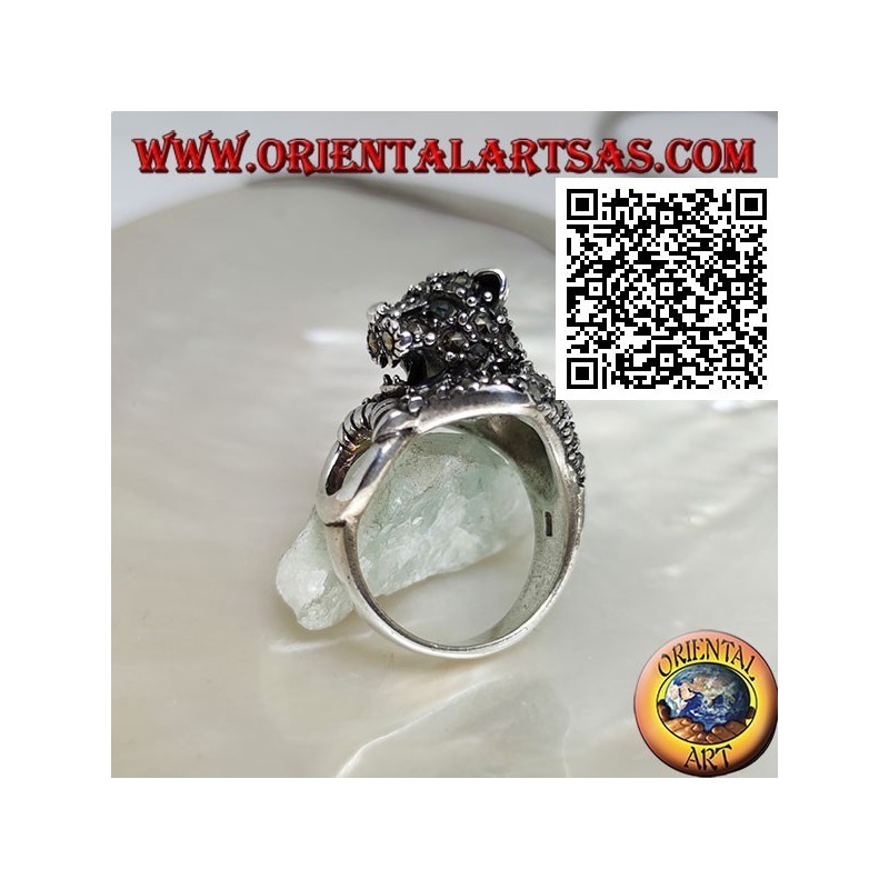 Half-length tiger silver ring studded with marcasite grabbing a ring