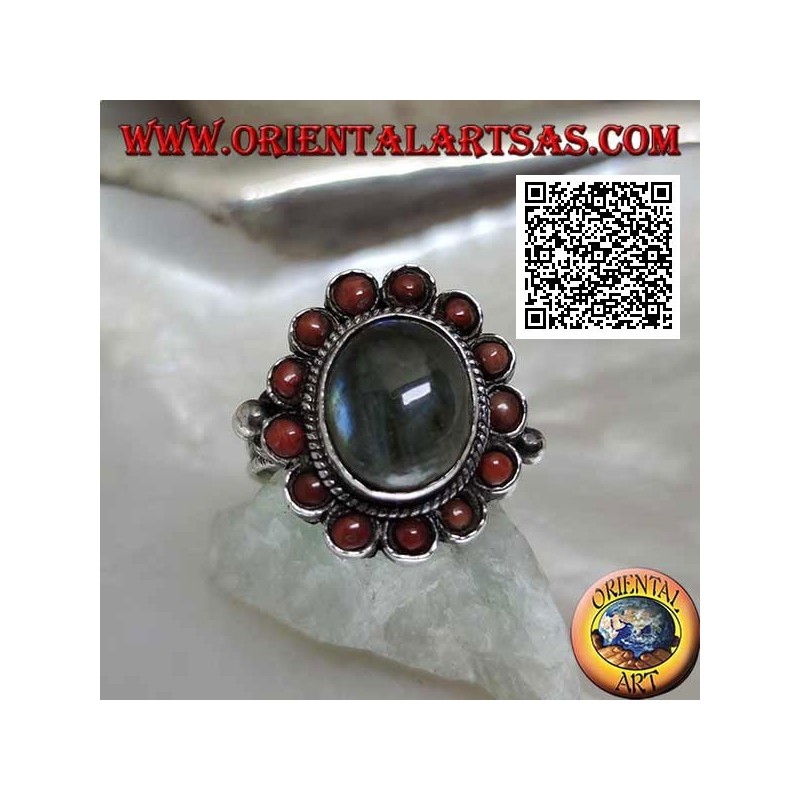 Silver flower ring with oval cabochon labradorite surrounded by Tibetan corals