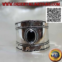 Wide band silver ring with oval onyx and oblique engravings on the sides, Bali