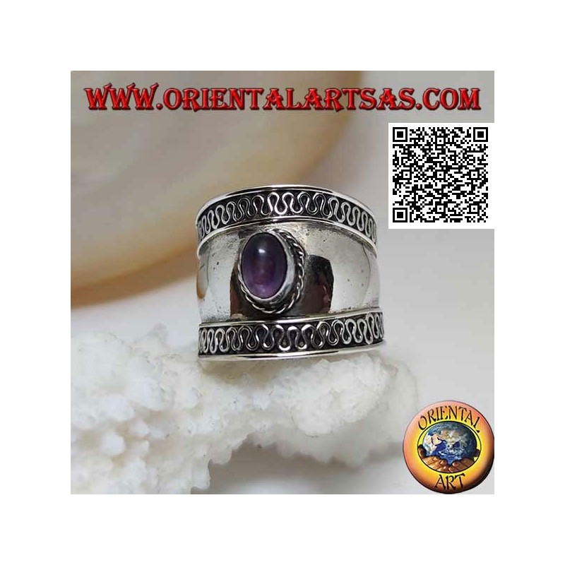 Wide band silver ring with oval cabochon amethyst and serpentine on the sides, Bali