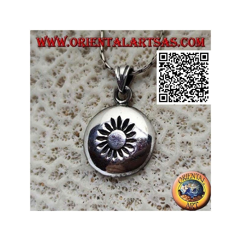 Silver pendant, rounded rounded medal with sun engraved in the center