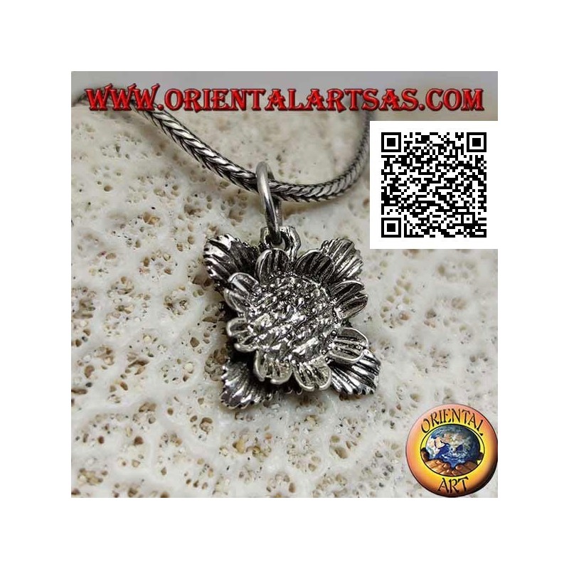 Silver pendant in the shape of a sunflower with leaves