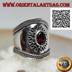 Wide band silver ring with oval garnet surrounded by serpentine and intertwining on the sides, Bali (freesize)