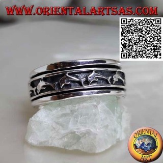 Bague en argent tournante anti-stress, avec une série de dauphins sauteurs en bas-relief