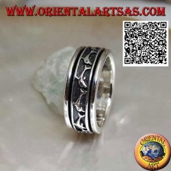 Anti-Stress rotierender Silberring mit einer Reihe springender Delfine im Basrelief