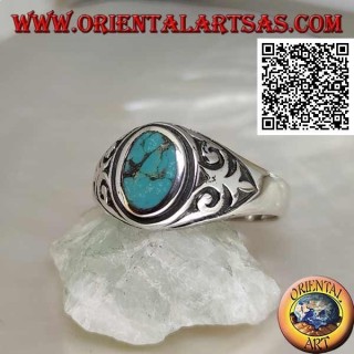 Anello in argento con turchese naturale ovale con giglio imperiale in bassorilievo sui lati