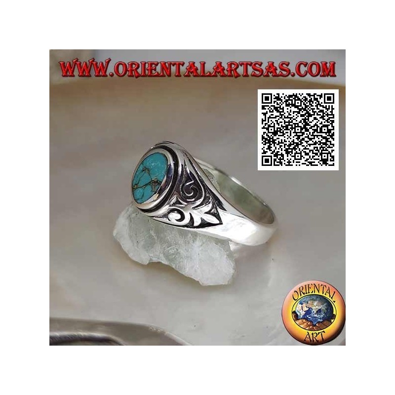 Anello in argento con turchese naturale ovale con giglio imperiale in bassorilievo sui lati