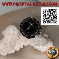Silver ring with a round cabochon-shaped Black Star on a high-edged frame with trio of discs