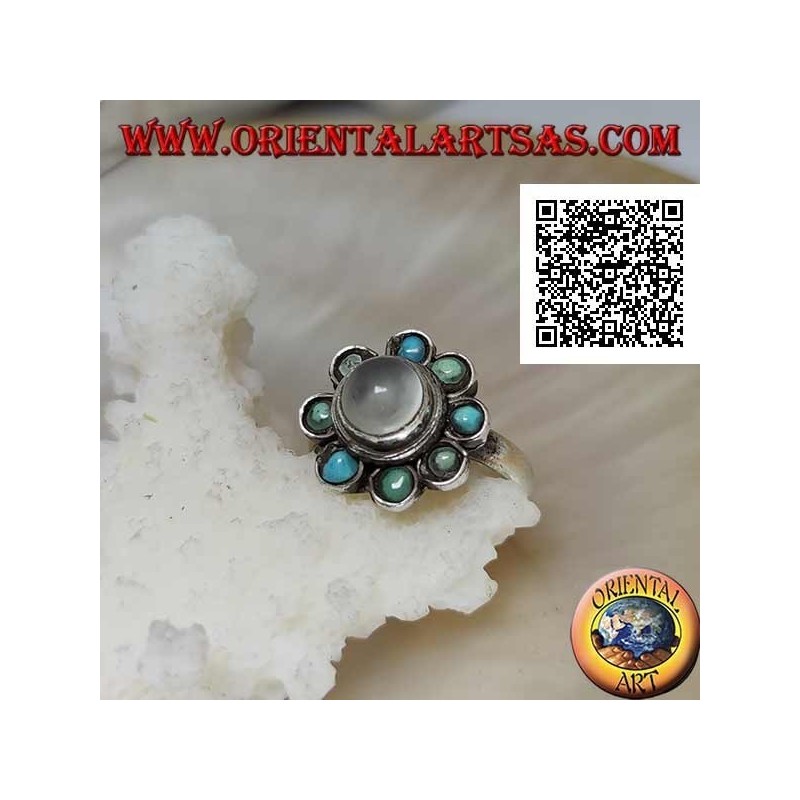 Anello in argento a margherita con pietra di luna tonda cabochon contornata da turchesi
