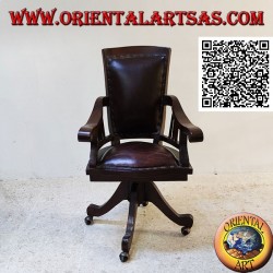 Office armchair in teak wood with upholstered seat and back upholstered in leather and wheels
