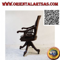 Fauteuil de bureau en bois de teck avec assise et dossier rembourrés en cuir et roues