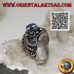 Silver ring with oval lapis lazuli and wavy beaded ethnic decoration