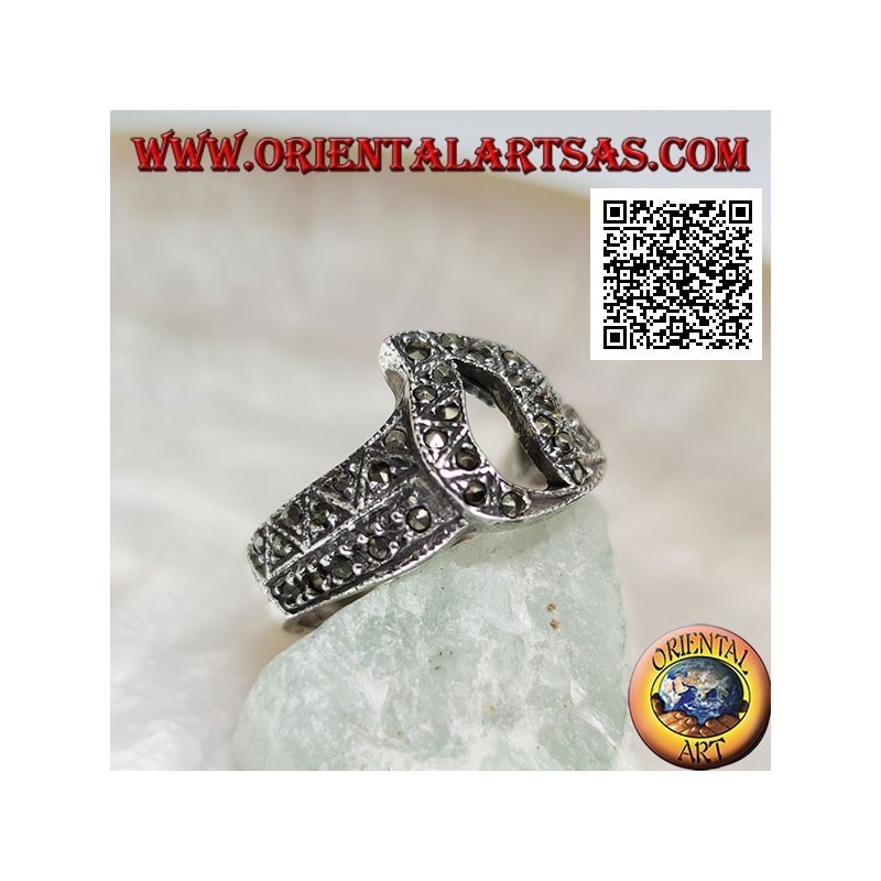 Bague en argent avec flamme centrale percée parsemée de marcassite