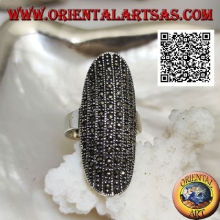 Silver ring in a large elliptical shape with a rounded center studded with marcasite