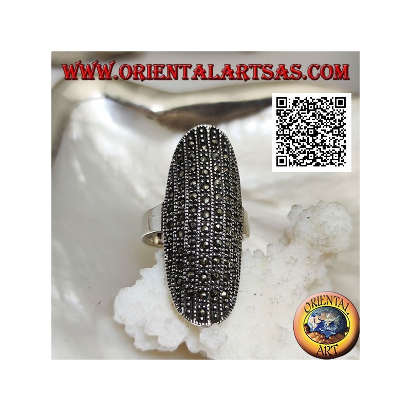 Silver ring in a large elliptical shape with a rounded center studded with marcasite