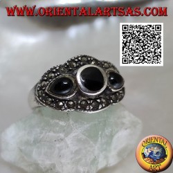Silver ring with round onyx between onyx drops surrounded by marcasite