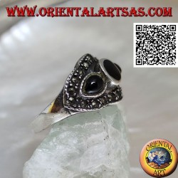 Silver ring with round onyx between onyx drops surrounded by marcasite