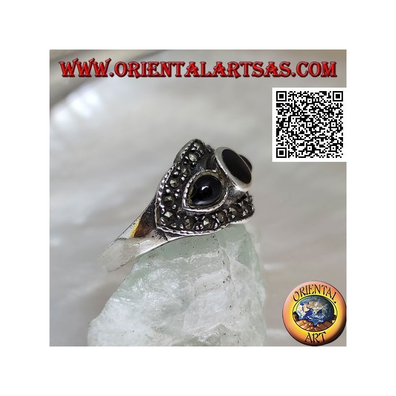 Silver ring with round onyx between onyx drops surrounded by marcasite