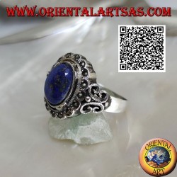 Silver ring with oval cabochon lapis lazuli surrounded by marcasite and perforated butterfly on the sides