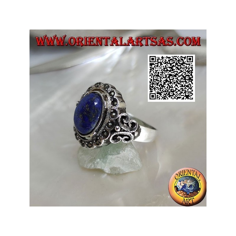 Silver ring with oval cabochon lapis lazuli surrounded by marcasite and perforated butterfly on the sides