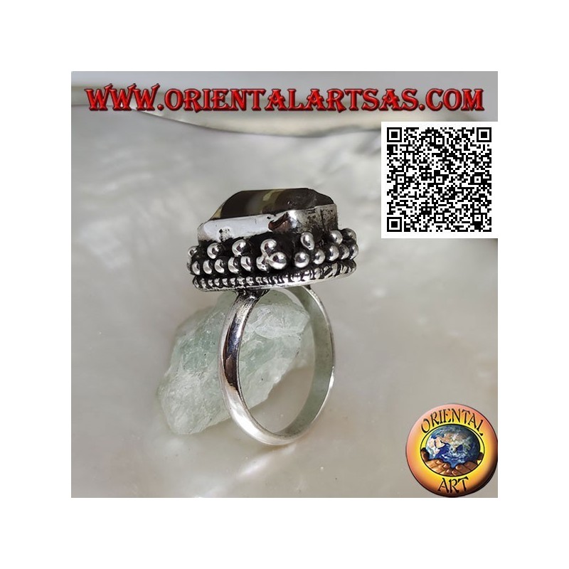 Silver ring with ancient Tibetan Dzi agate from the first half of the 20th century surrounded by balls