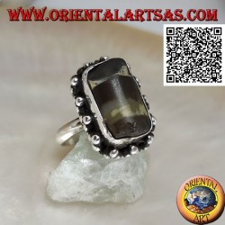 Silver ring with ancient Tibetan Dzi agate from the first half of the 20th century surrounded by balls