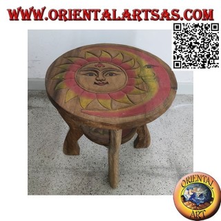 Low round coffee table in suar wood with hand painted engraved sun