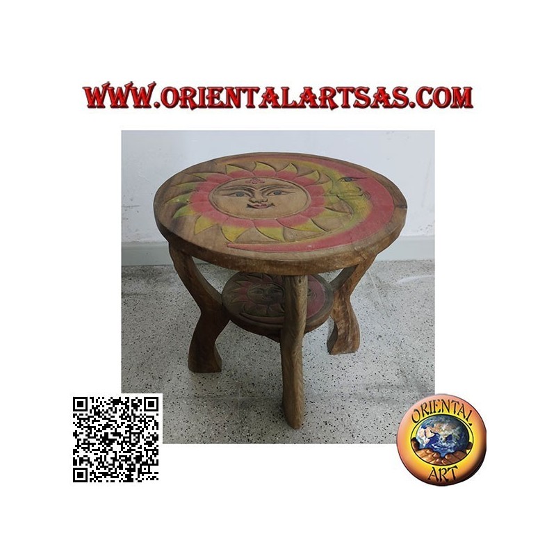 Low round coffee table in suar wood with hand painted engraved sun
