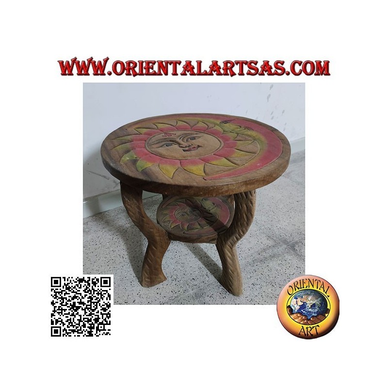 Low round coffee table in suar wood with hand painted engraved sun
