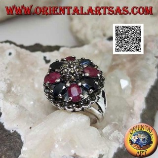 Silver ring with natural oval rubies and sapphires set with central maracssite on dome and around