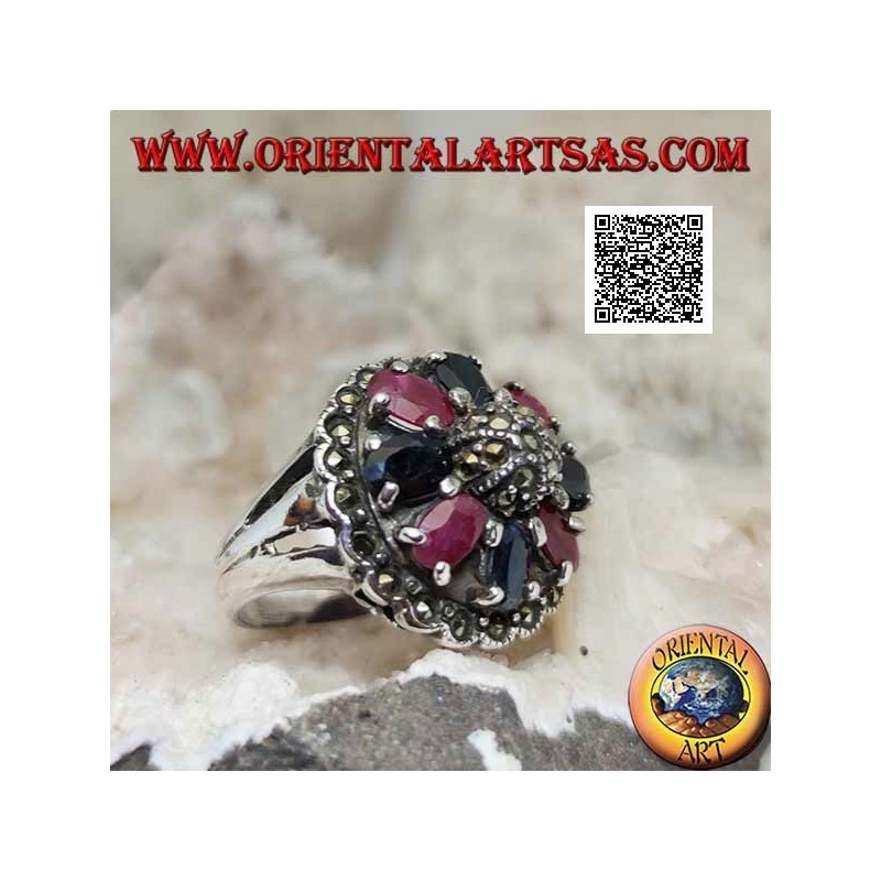 Silver ring with natural oval rubies and sapphires set with central maracssite on dome and around
