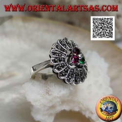 Silver flower ring with trio of central ruby and emerald colored zircons and long marcasite petals