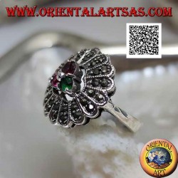 Silver flower ring with trio of central ruby and emerald colored zircons and long marcasite petals