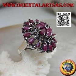Silver ring in the shape of a large rose window with natural shuttle rubies and marcasite alternating in circles