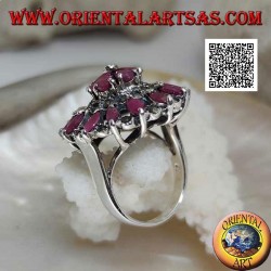 Silver ring in the shape of a large rose window with natural shuttle rubies and marcasite alternating in circles