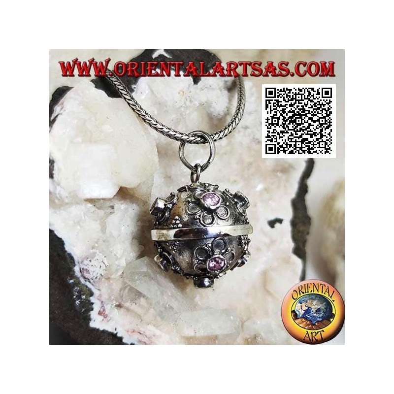 Silver pendant "Call of the Angels" with small flowers in relief and central pink zircon (Ø 20mm.)