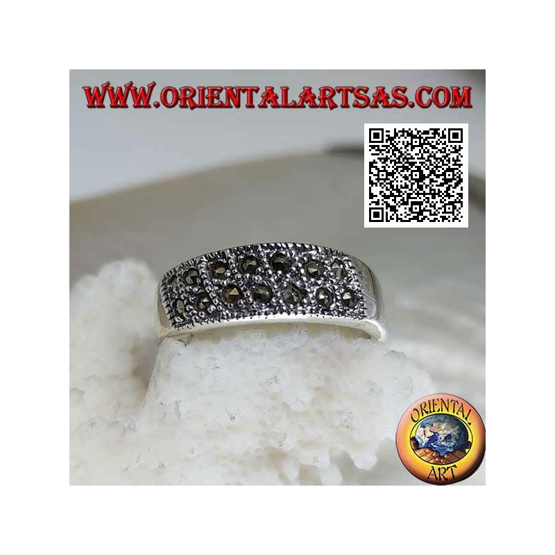 Silver band ring with rows of two oblique marcasites on the front