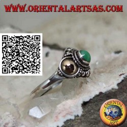 Bague en argent avec une sphère de jade et des plaques d'or sur les côtés