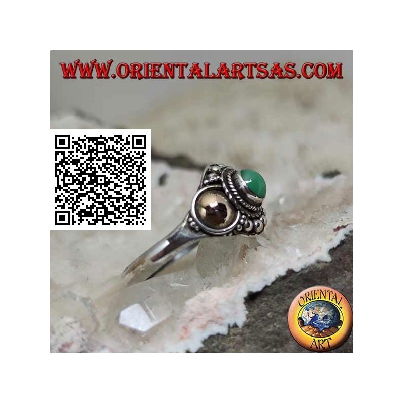 Silver ring with a jade sphere and gold plates on the sides