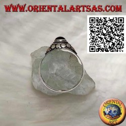 Silver ring with an onyx sphere and gold plates on the sides