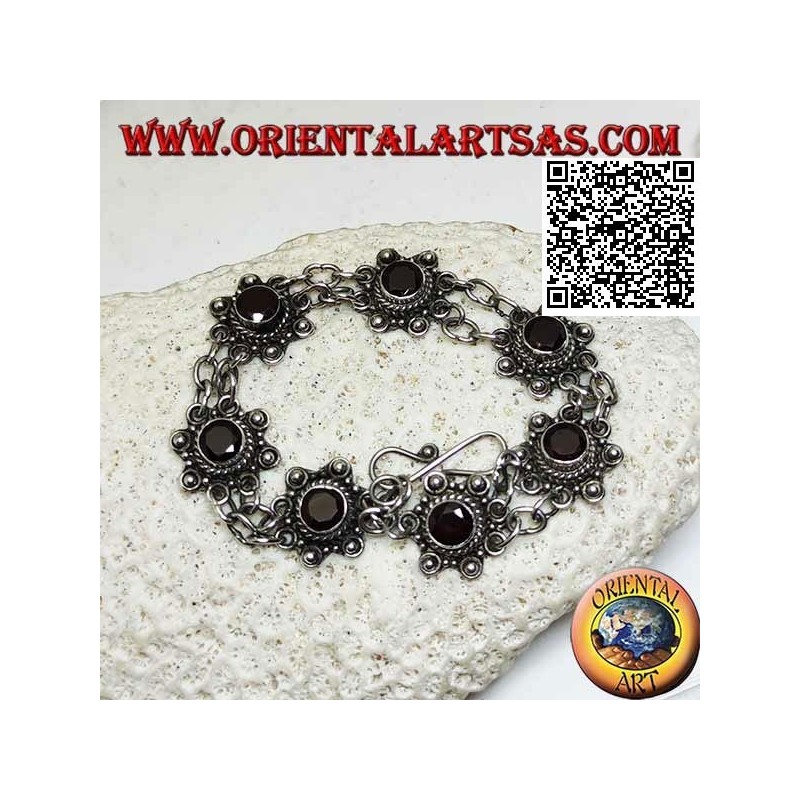 Pulsera de plata de 7 flores con granate facetado redondo central unidas por dos cadenas