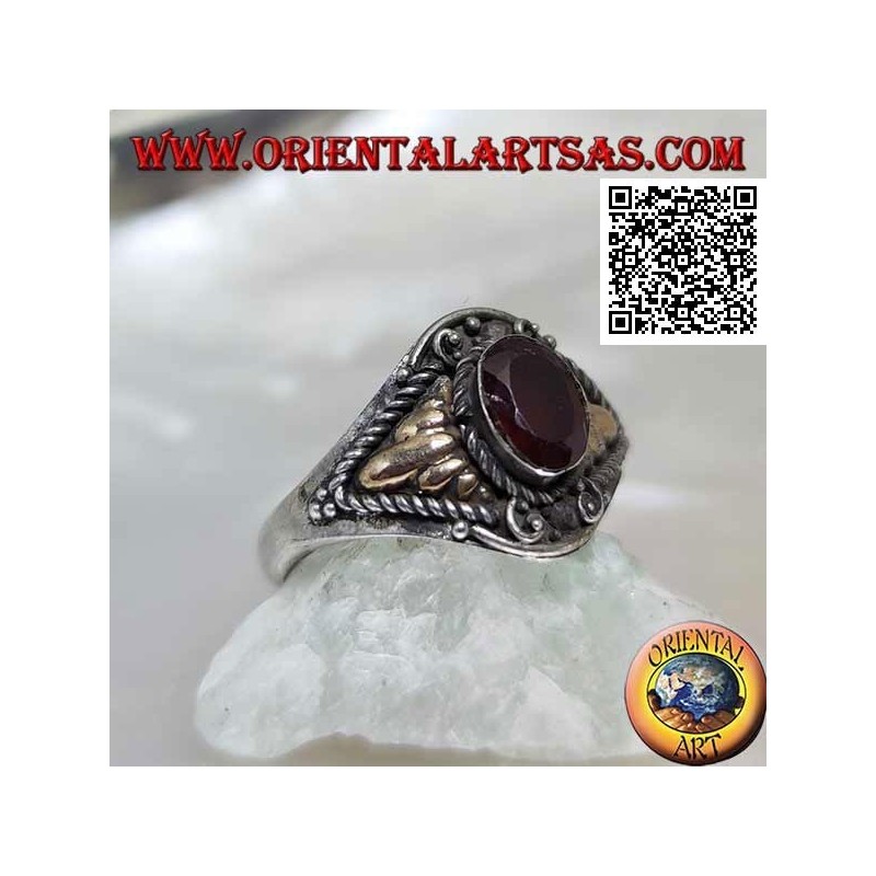 Silver ring with oval garnet and triangular cords with gold plate